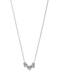 Fossil gets to the heart of the matter with this necklace. Crafted from stainless steel, the chain and heart are accented with clear glass crystal beads for a nice touch. Approximate length: 16 inches + 2-inch extender. Approximate drop: 1/4 inch.