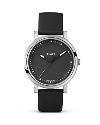 Timex's Modern Easy Reader makes a retro-cool impression, from the sleek leather strap to the blissfully uncomplicated brass silver case. It's casual with the guys and stylish at the water cooler.