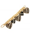 Wild at heart. This chain bracelet from Betsey Johnson is crafted from gold-tone mixed metal with black heart glass stones with crystal accents, some of which are styled with leopard print for a bit of animal attraction. Approximate length: 7-1/2 inches.