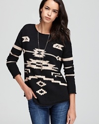 This bold Townsen sweater captures one of the season's best print trends and can be dressed up or down with accessories. Wear it one day with a chunky necklace, try it another day with stacks of bright bangles!