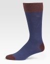 Contrast cuff, heel and toe define comforting socks that offer warmth without bulk. Mid-calf height Ribbed cuff 72% cotton/26% nylon /2% spandex Machine wash Imported 