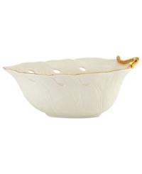 Fresh pick. The large Eternal Leaf bowl from Lenox captures the intricacies of flora in fine ivory porcelain with polished gold trim and pierced accents.