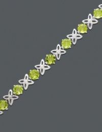 Wrap your wrist in kisses and hugs. Sterling silver X's and round-cut peridot O's (8-1/2 ct. t.w.) alternate for an bracelet that will make others green with envy. Approximate length: 7 inches.