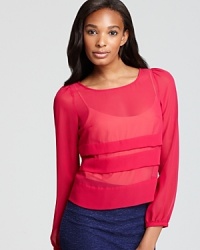 Tiered for style, this BCBGeneration blouse is sheer genius in elegant chiffon.