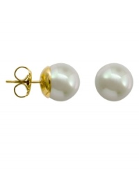 From the island of Mallorca, Spain, these stud earrings feature always-classic white round organic man-made pearls (12 mm) with 14k gold posts.