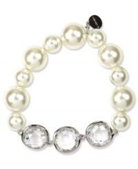 Chunky sophistication from Givenchy. Large stones in glass crystal and cubic zirconia add elegance to this stretch bracelet. Stretches to fit wrist. Crafted in imitation rhodium plated mixed metal. Approximate diameter: 1-7/8 inches.