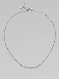 A delicate style featuring a curved bar encrusted in sparkling rhinestones on a link chain. Silvertone brassGlass stonesLength, about 16Toggle closureImported 