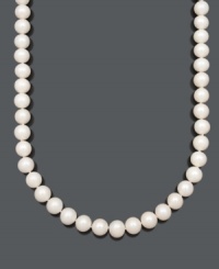 Simplicity and elegance combine in a chic strand of pearls. Belle de Mer necklace features cultured freshwater pearls (10-11 mm) with a 14k gold clasp. Approximate length: 16 inches.