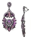 So spectacular: A cascade of regal gemstones composes this pair of Carolee Lux chandelier earrings, which so perfectly channel this season's dark and glamorous mood.