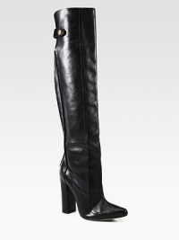 A powerful heel lifts this ultra-tall leather silhouette, fit for an urban warrior. Self-covered heel, 4½ (115mm)Shaft, 20Leg circumference, 15Leather upperPull-on style and strap with snap closuresLeather lining and solePadded insoleImported