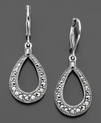 Shining silver style: these fashionable Judith Jack earrings feature sterling silver and genuine marcasite. Approximate drop: 1-1/4 inches.