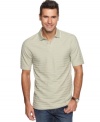 Lose the dress shirt and kick back for the weekend in this striped polo shirt from Van Heusen.