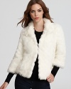 Warm up to this vintage-inspired faux fur GUESS jacket--a timeless fashion piece for now and later in the season.