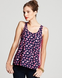 Get ready for your closeup in this Lilly Pulitzer top touting a kitschy kiss print and a contrast back panel. The perfect accessory--a bold red lip.