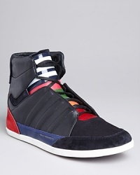 Designer Yohji Yamamoto brings his distinctive take on cutting-edge Japanese fashion with the Honja high-top leather sneaker. Suede and canvas panels and a multicolored tongue add flash and depth.