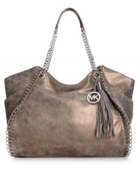 Elegance with an edge, this titillating tote from MICHAEL Michael Kors is all about attitude. Crafted from sumptuous leather with whipstitch and chain detail and signature hardware, this diva-licious design also features a roomy interior with plenty of pockets for the day-to-night essentials.