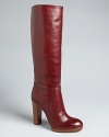 KORS Michael Kors has designed a perfect pair of workday to play tall platform boots.