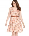 Have fun in the sun with American Rag's sleeveless plus size dress, featuring a slimming A-line shape