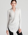 Modern draping lends easy elegance to this Helmut Lang top--the perfect piece for fall layering.