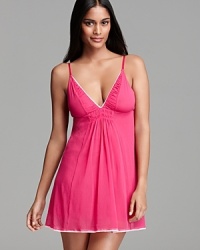 OnGossamer's pretty-in-pink nightie lends feminine flair with a shirred neckline and scalloped trim.