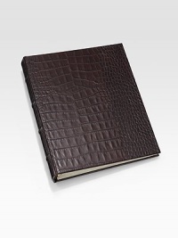 Rich, crocodile-embossed Italian leather holds treasured photos in the nicest way for storage and display. 18 clear pocket leaves hold 72, 4 X 6 photos 7¾ X 9½ Made in USA