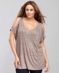 Sexy cutouts and edgy studs create a unique combination of tough and tender on INC's plus size, party-ready top!