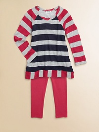 Two tones of wide rugby stripes on a cozy waffle knit with subtle sparkle join solid jersey leggings in this delightful duo. TopScoop necklineLong raglan sleevesVertical striped hem Pants Elastic waistbandSmooth jerseySlim legging fitTop: rayon/modal/cotton/LurexPants: cotton/modal/spandexMachine washImportedAdditional InformationKid's Apparel Size Guide 