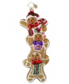 It all stacks up to one sweet Christmas tree. Three gingerbread men dusted in bronze glitter and decked with candy accents give this handcrafted Christopher Radko ornament its irresistible whimsy.