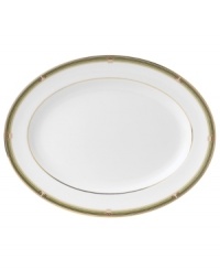 In 18th century England, Josiah Wedgwood, creator of the world famous Wedgwood ceramic ware, established a tradition of outstanding craftsmanship and artistry which continues today. The exotic floral design of the Oberon dinnerware and dishes pattern is finely scaled and exquisitely precise, in soft shades of green and gold accented with black, against pure white bone china.