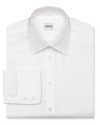 Carefully crafted in exceptional cotton for superior workweek refinement, this solid dress shirt provides the ultimate in comfort and boasts classic appeal for a tried-and-true wardrobe staple.