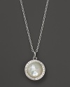 A luminous mother-of-pearl stone is set in a glittering diamond bezel on Ippolita's Lollipop necklace.