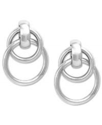 Mix it up with these twisted hoops from Jones New York. Crafted from silver tone mixed metal. Approximate drop: 1 inch.