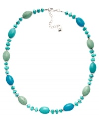 Stylishly Southwestern. Reconstituted turquoise beads adorn this eye-catching necklace from Lauren Ralph Lauren. Whether you wear it to work or with more casual daytime outfits, it's sure to stand out as a chic complement. Crafted in mixed metal. Approximate length: 18 inches + 2-inch extender.