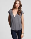 This simple silk top from Joie is a versatile piece you can wear all year long. Dress it down with denim cutoffs in the summer or pair it with your favorite skinny jeans in the fall.