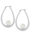 Having a ball. Robert Lee Morris puts simulated plastic pearl accents to stylish effect in this pair of oval hoop earrings. Crafted from silver-tone mixed metal. Approximate drop: 1-3/4 inches.