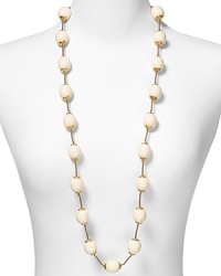 RJ Graziano channels '40s-inspired chic with this beaded necklace. Egg-shaped ivory beads capped with gold tone hardware blend elegantly with a range of looks.