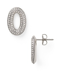 Crafted from rhodium plated metal and crystal stations, Nadri's open link hoop earrings encapsulate sophisticated accessorizing. Wear them to pull together your evening look.