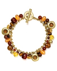 Update your wardrobe with a tribal touch. This beaded Lauren by Ralph Lauren bracelet does that with its cool cascade of multi hued beads and worn gold plate.