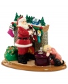 A sleepy little girl will meet Santa only in her dreams in this precious figurine from Department 56. Cookies and milk on the ottoman and a tiny Christmas village on the mantel complete the jolly holiday scene.