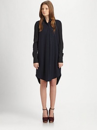 Tap into the minimalist mood with this relaxed wool-rich shirtdress, emboldened by a stand collar, oversized patch pocket and shirttail hem. Stand collarButton frontLong sleeves with buttoned cuffsSingle front patch pocketShirttail hem with back slitAbout 22 from natural waist96% wool/4% LycraDry cleanImportedModel shown is 5'7 (174cm) wearing US size 2.This style runs large. We recommend ordering one size down for a standard fit. 