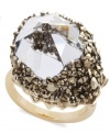 Inspired by the earth -- Swarovski's gold tone mixed metal cocktail ring will remind you of natural minerals. Embellished in small Crystal Metallic Light Gold crystals, the exclusively cut transparent centerpiece reflects the light magnificently. Size 7.