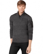 This handsome Calvin Klein Jeans sweater has a classic look that can be dressed up or down for versatile style.