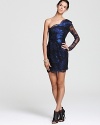 Irresistible in lace and metallic silk, this Madison Marcus dress is evening wear with an edge.