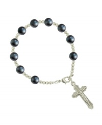 Share your faith in style with rosary-themed jewelry by Vatican. Bracelet features an intricate crucifix charm strung on a delicate chain with dark blue cat's eye beads. Setting and chain crafted in silver tone mixed metal. Approximate length: 7 inches. Approximate drop: 1-1/4 inches.