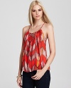 An eclectic print packs a punch on this wispy GUESS tank, featuring a flattering gathered neckline.