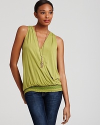 An embroidered smocked hem lends bohemian flair to this gorgeously draped Michael Stars tank.