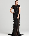 With dramatic draping, Tadashi Shoji's utterly glamorous gown stops the show with a delicately sequined bodice.