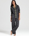 Ready, set, sleep in LAYLA's star-print pajamas with contrast trim and a classic notch-collar top.