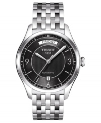 Classically handsome, this automatic Tissot watch features a stainless steel bracelet and round case. Black textured dial with logo, day window, date window, silvertone stick indices and numerals at three o'clock, six o'clock and nine o'clock. Automatic movement. Water resistant to 50 meters. Two-year limited warranty.