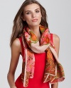 Go for bohemian style with this vibrant scarf featuring an intricate circular pattern.